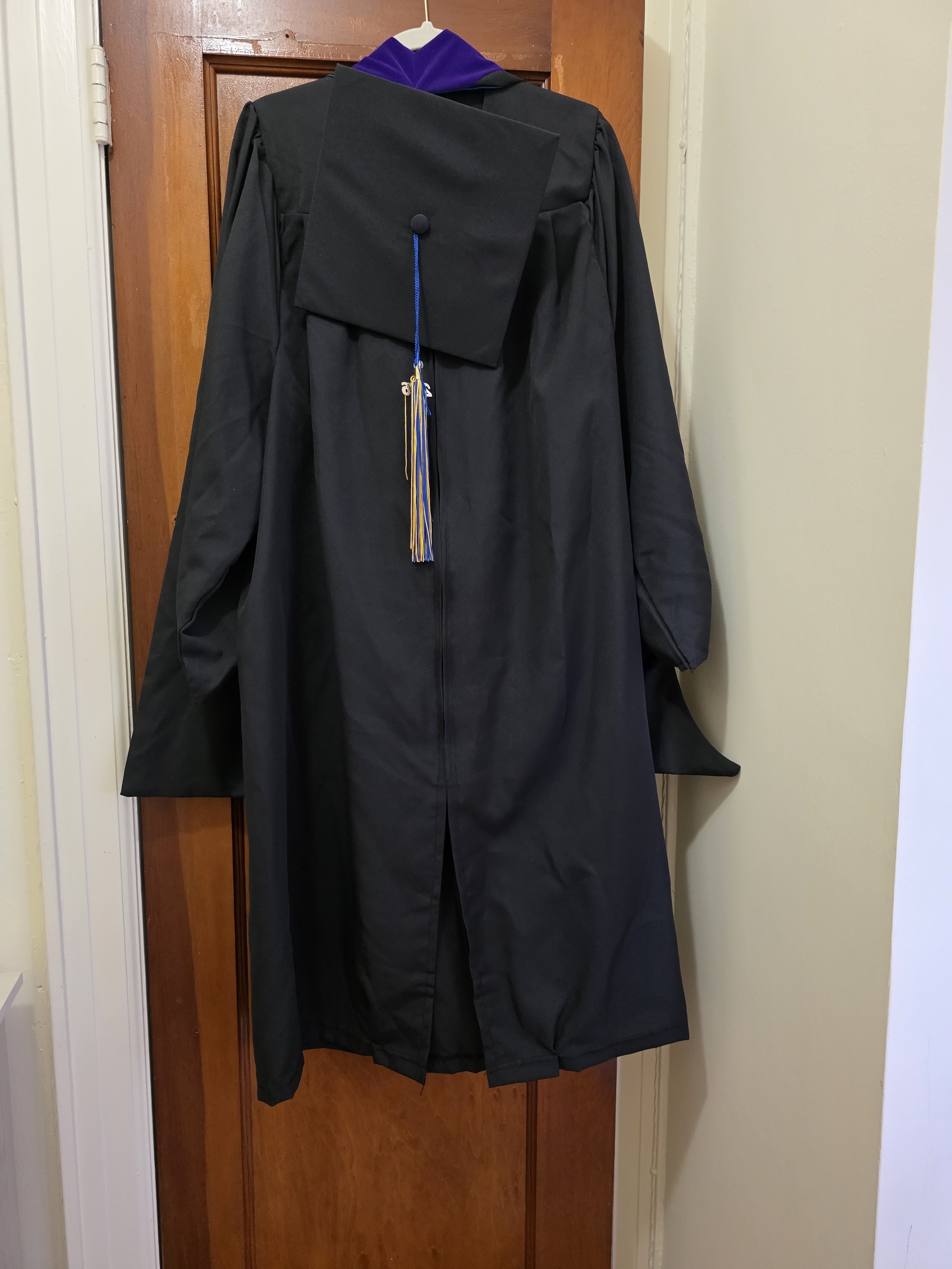 Black Graduation Gown With Purple Hood And Blue/Gold Tassel